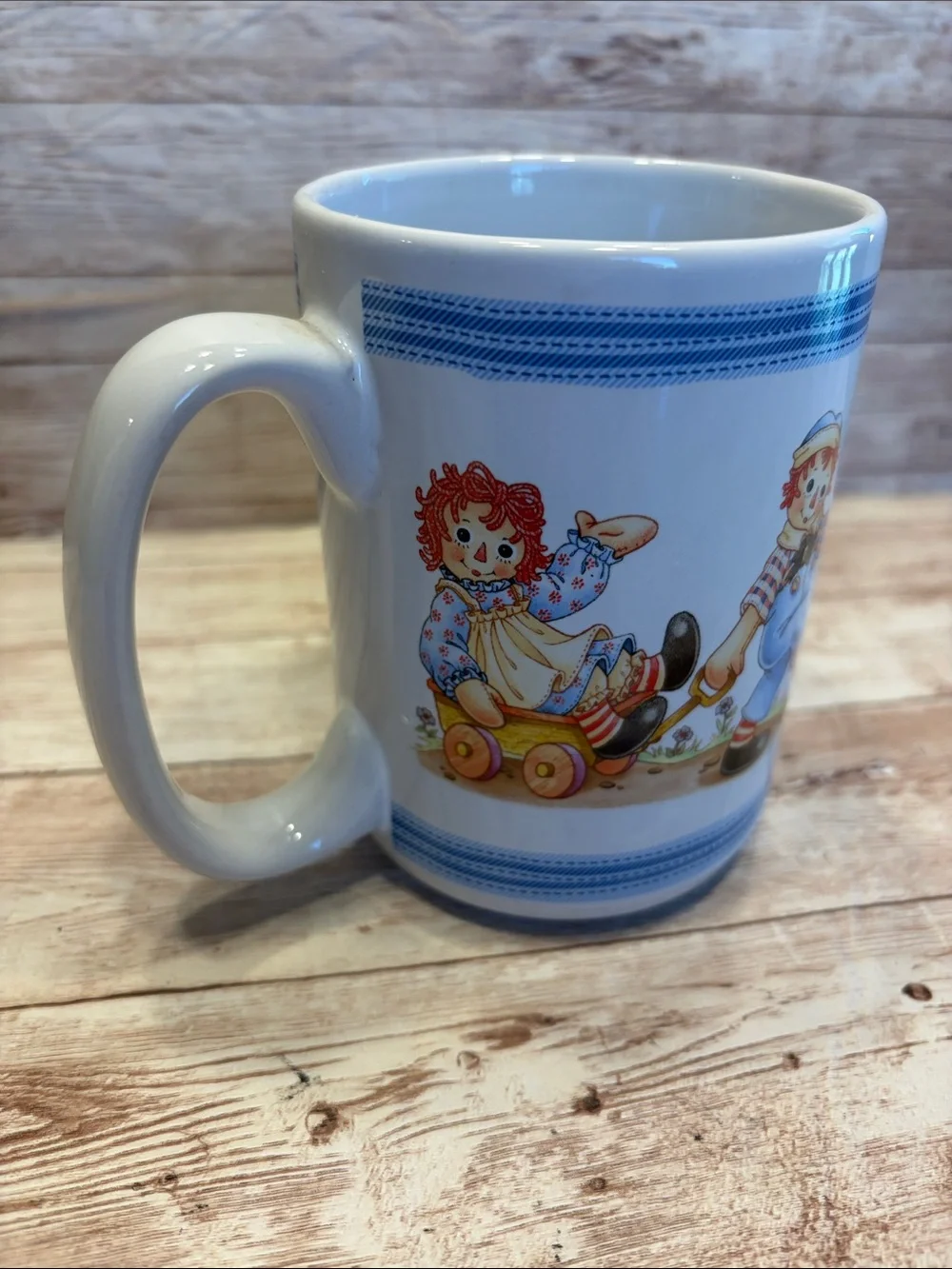 Vintage Raggedy Ann and Andy Ceramic Coffee Mug with Cartoon Illustration